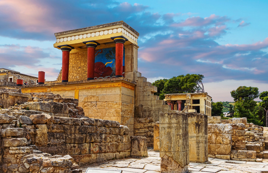 Ancient ruins of the Palace of Knossos in Heraklion, Crete with colorful frescoes and columns