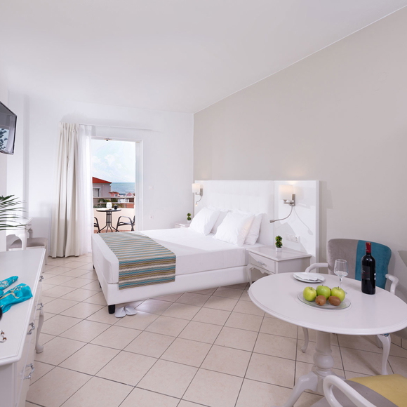 Elegant double room at Dore Hotel by Trend Hotels in Chania with balcony and sea view