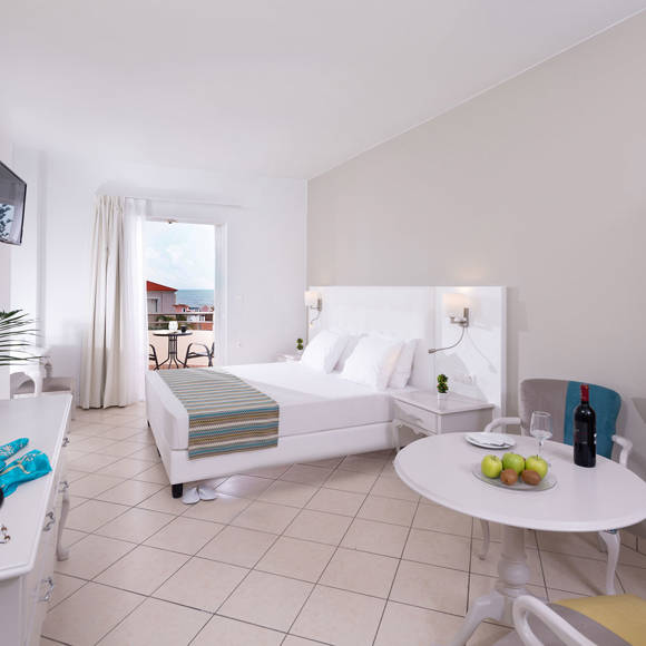 Elegant double room at Dore Hotel by Trend Hotels in Chania with balcony and sea view